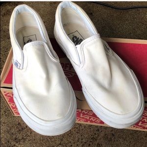 Dingy white vans